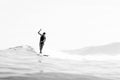 Minimalist black and white surf print with soft haze, surfer silhouette, and subtle ocean textures