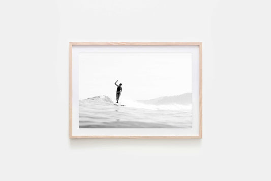 Framed Minimalist black and white surf print with soft haze, surfer silhouette, and subtle ocean textures