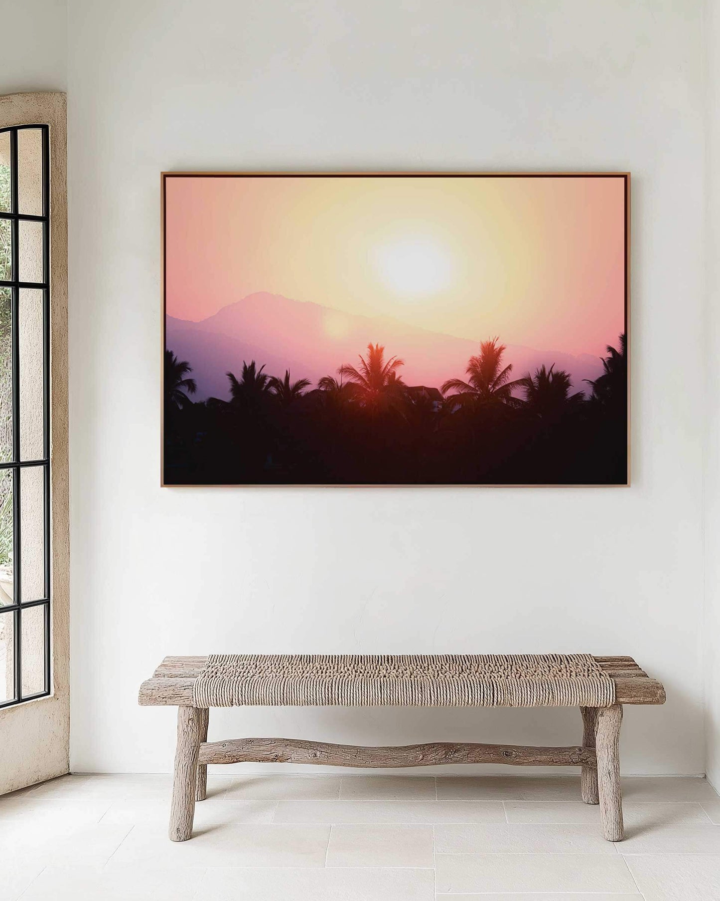 Framed fine art print of vivid sunrise colours over silhouette of palms and faint shapes of mountains in La Saladita, Mexico