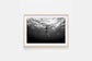 Framed Black and white underwater fine art nude photography captured at Gordon’s Bay, featuring female form in motion