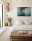 underwater nude fine art print close up of torso framed in clean minimally styled bedroom